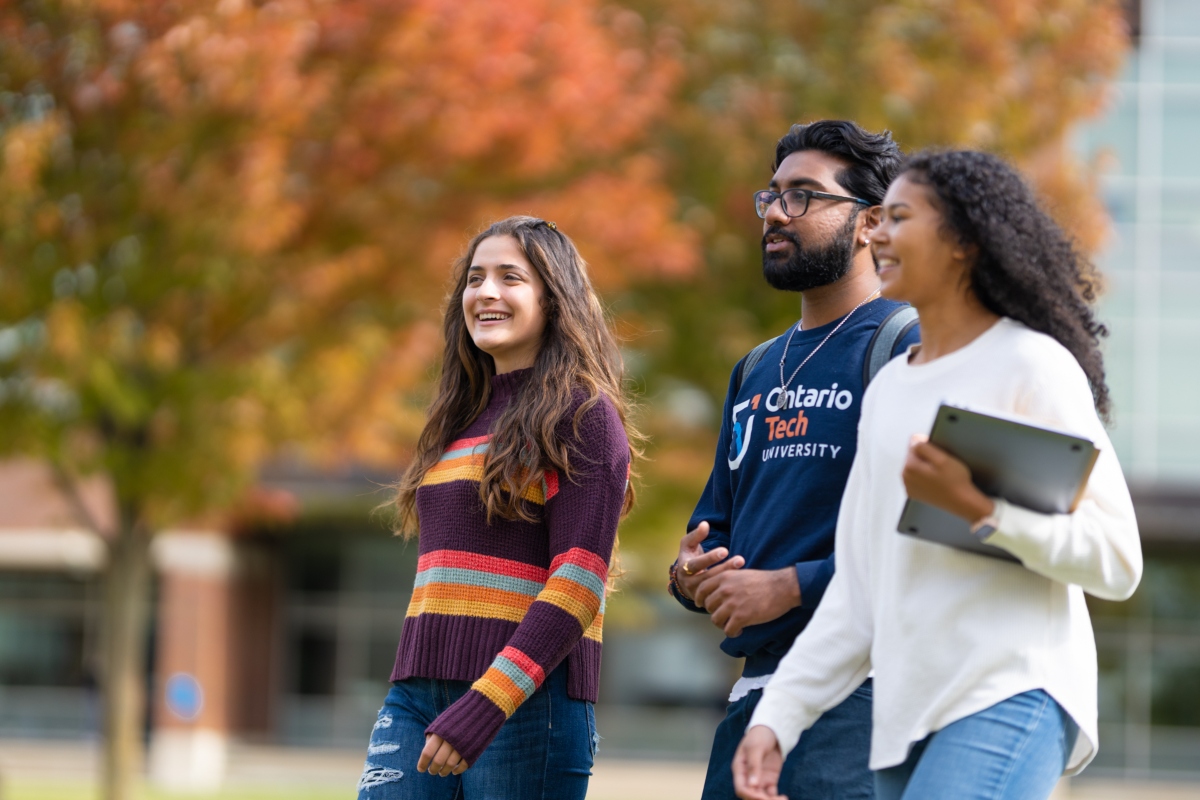 Students on Polonsky Commons, Ontario Tech University's north campus, in the fall