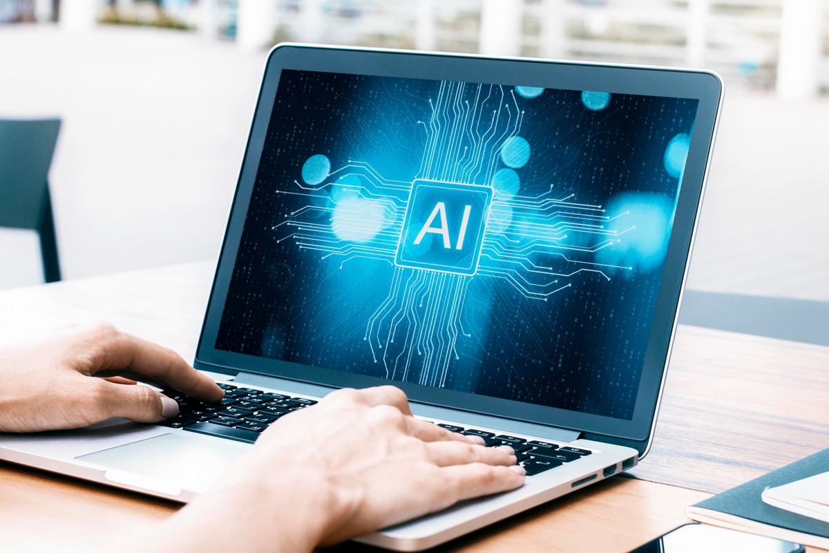 Image shows the letters "AI" on a computer screen