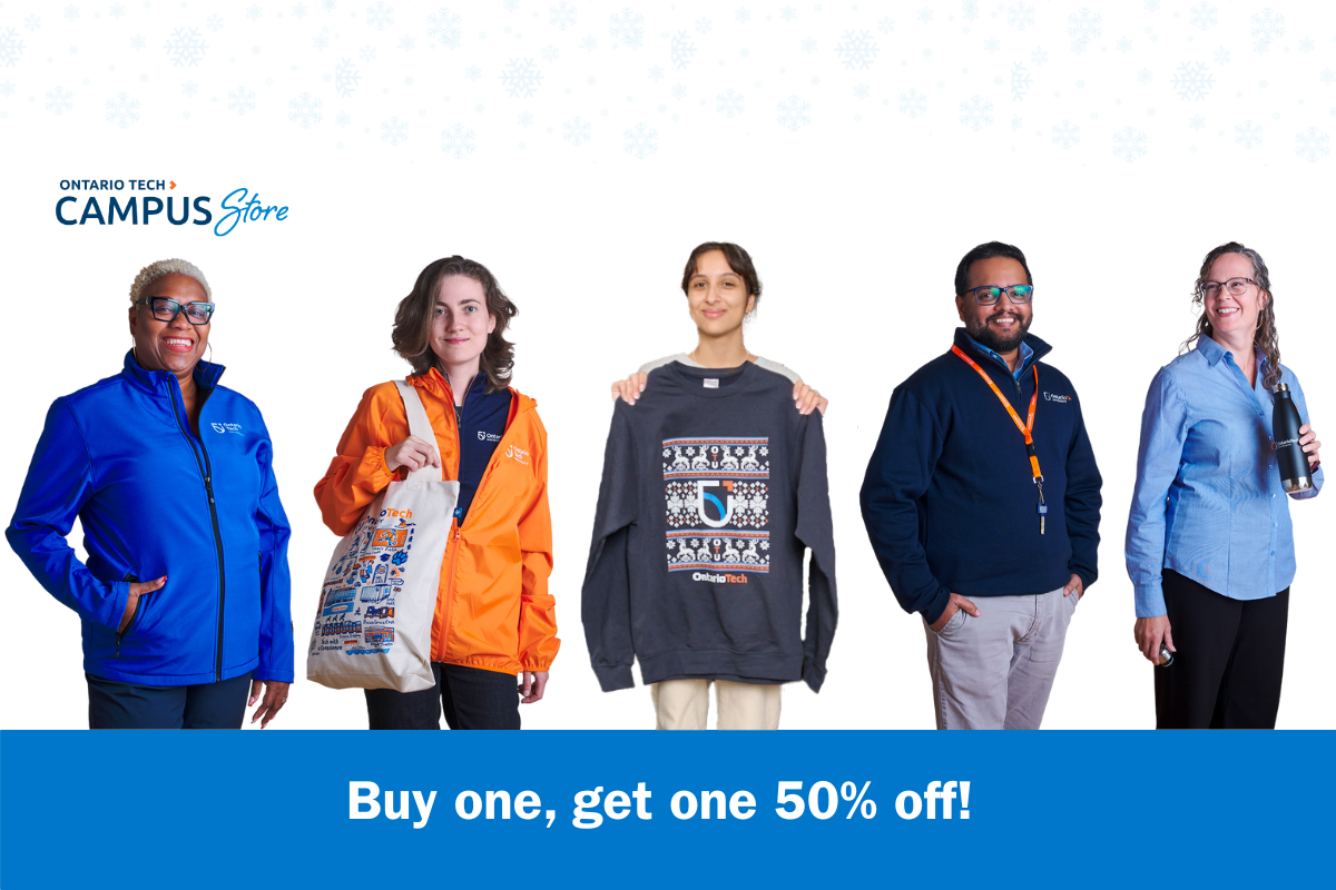 Faculty and staff wearing clothing from the Campus Store 