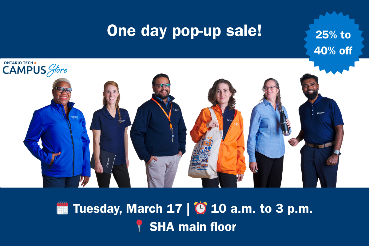 Staff wearing branded clothing from the Campus Store, promoting the pop-up sale