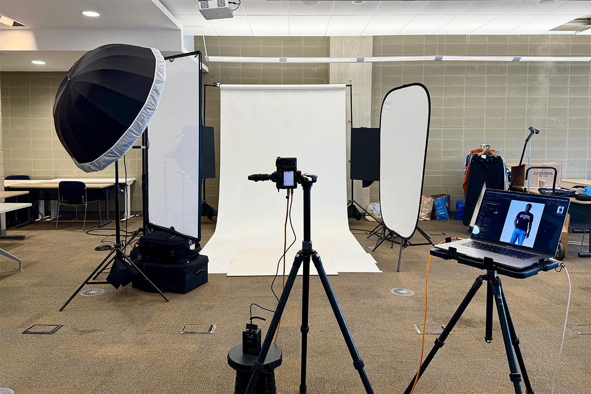 Photoshoot set with lights and a white backdrop