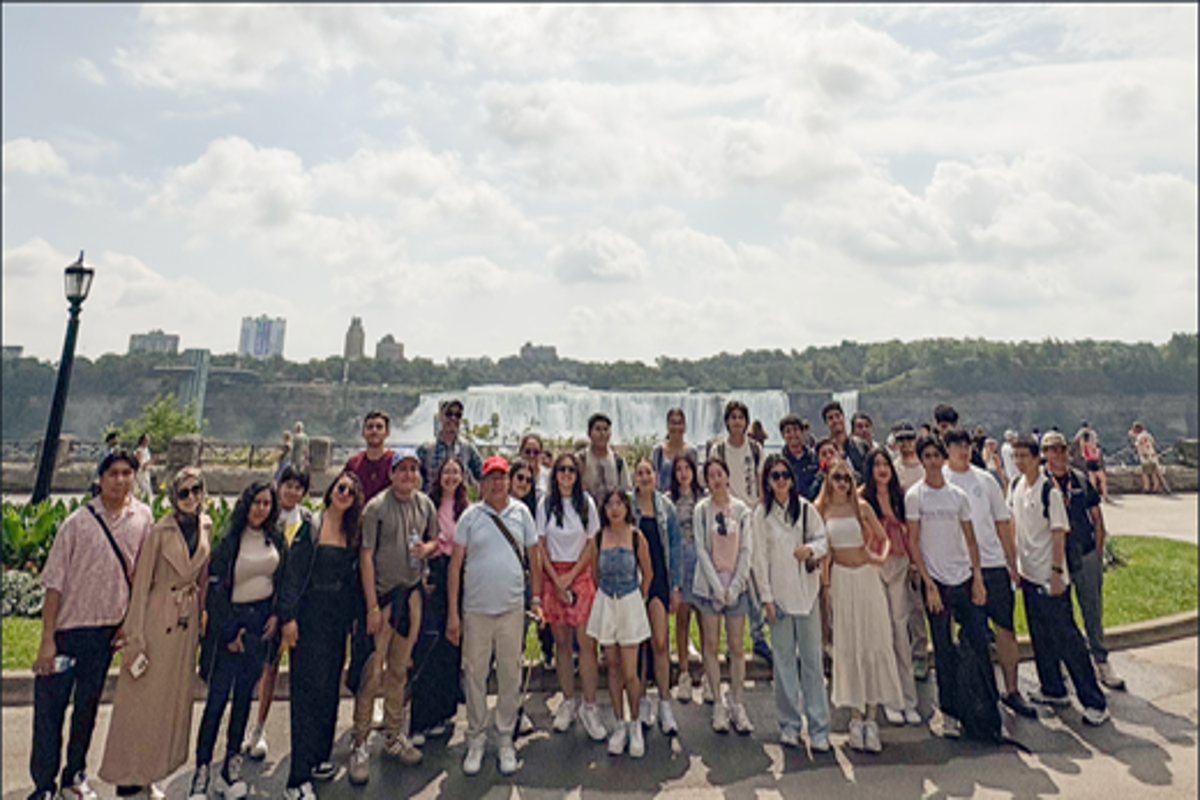 Students standing in front of Niagara Falls